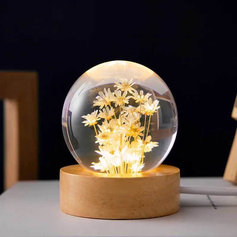 Luminous 3D dandelion crystal ball LED lamp on a beech wood stand, with USB plug.