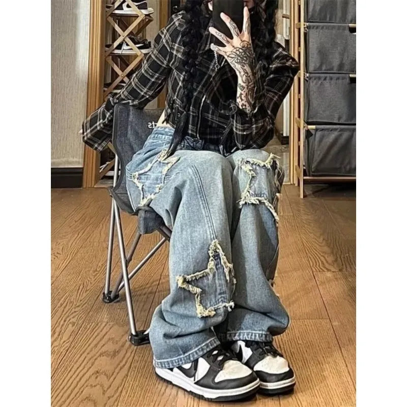 Blue cotton denim wide-leg high waist pants laid flat showing straight leg cut