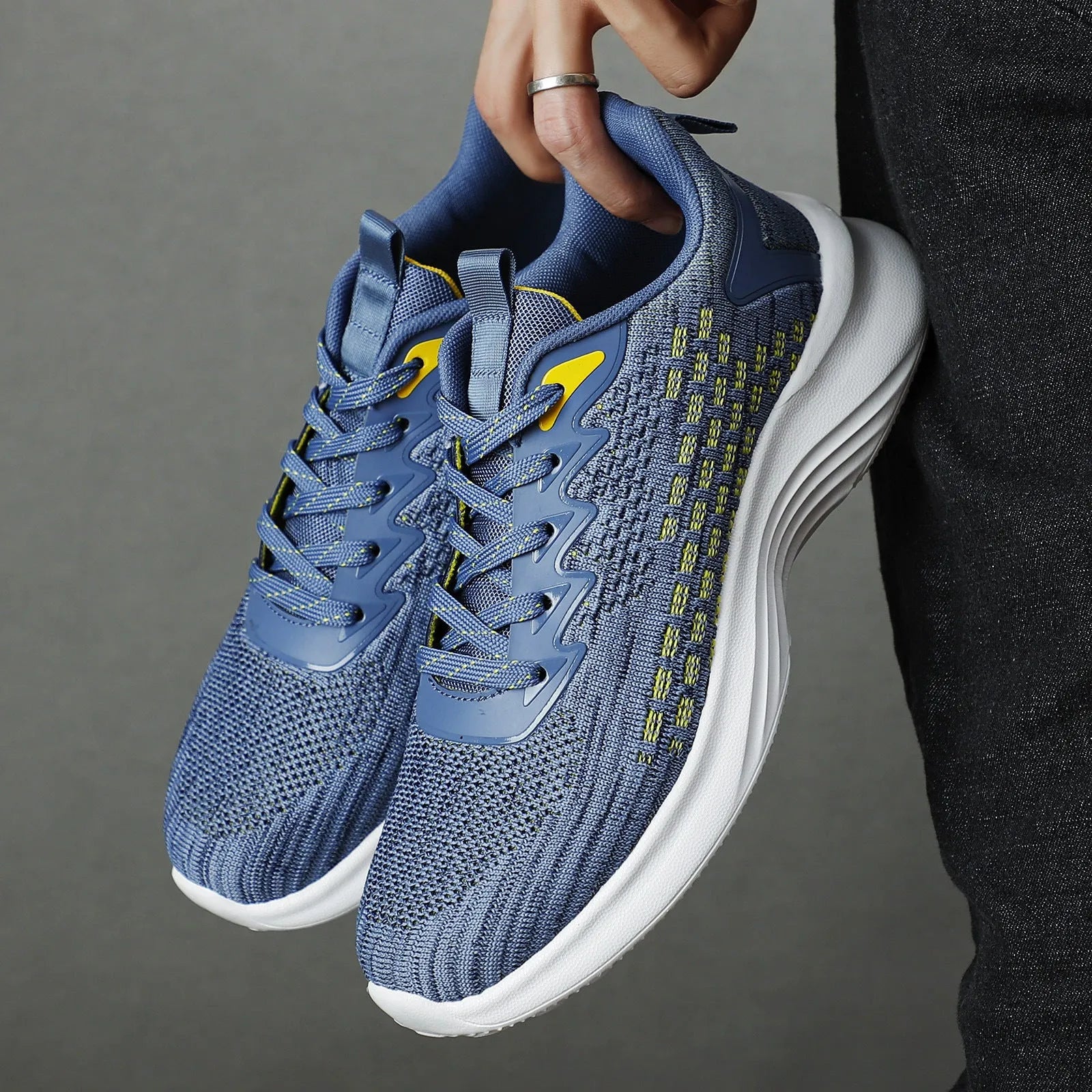 Women's lavender purple Flyknit running shoes with mesh lining and EVA sole on a white background.