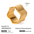 Silver stainless steel wide band ring with a geometric wave pattern surface design.