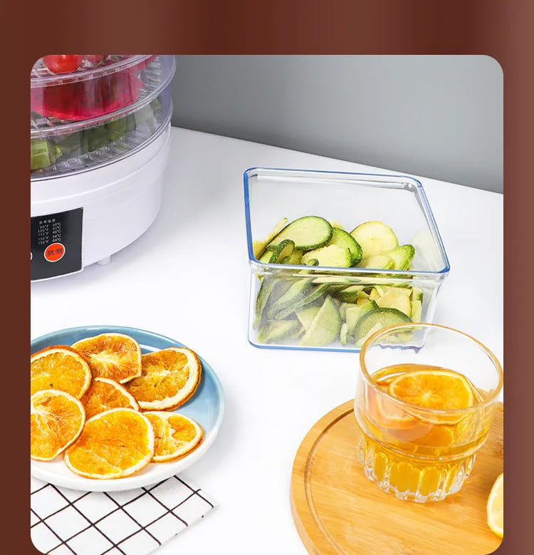 Five-tray household fruit dehydrator with removable shelves on kitchen counter