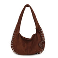 Soft plush retro style women's handbag in strapless tote design showing colour options
