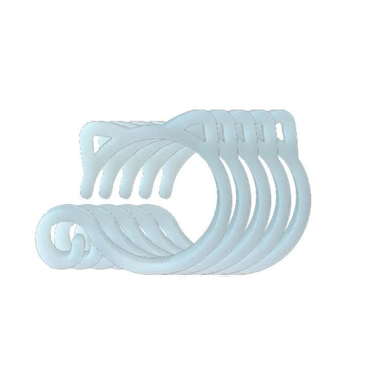 Small green cat-shaped plastic plant clip for supporting vines and stems in the garden.
