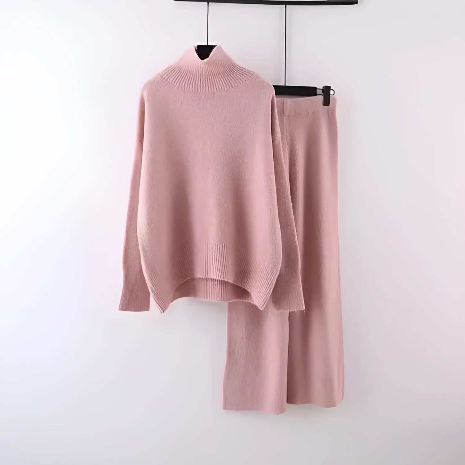 Women's beige casual sweater and wide-leg pants two-piece set on a hanger.