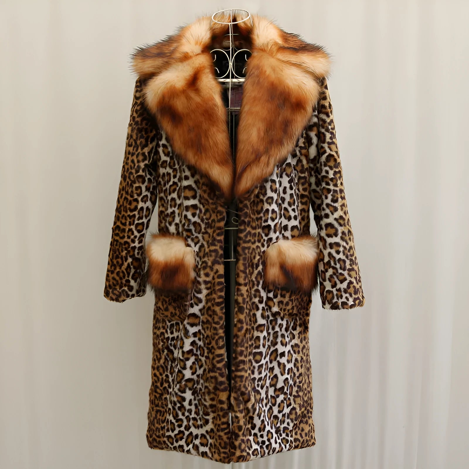 Women's long artificial fur jacket in leopard print, showing front view with regular sleeves.