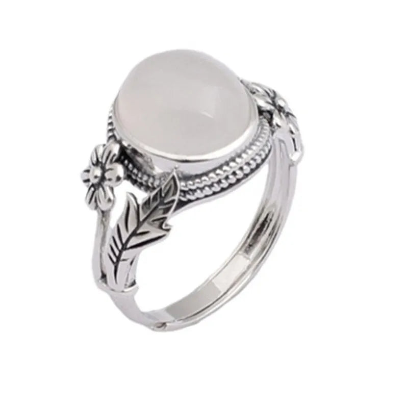 Adjustable open-mouth vintage ring in antiqued copper with a white chalcedony-style colour.