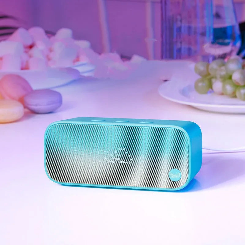 Elf Sugar Cube AI smart WiFi speaker in blue green red or white colour with bookshelf design