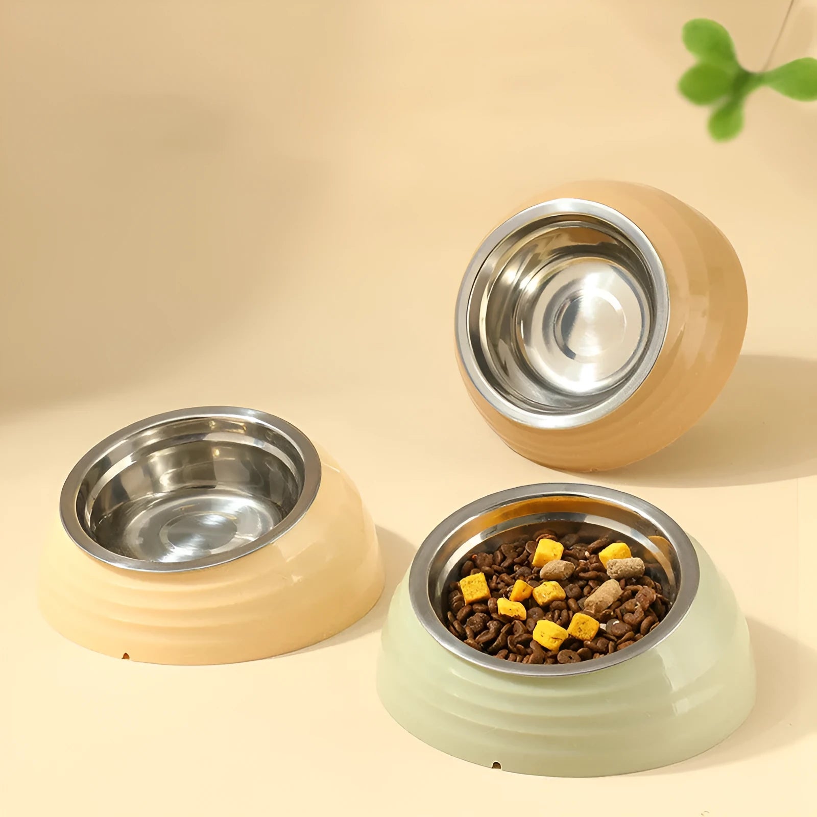 Stainless steel cat bowl in plastic holder available in beige, brown and light green colours
