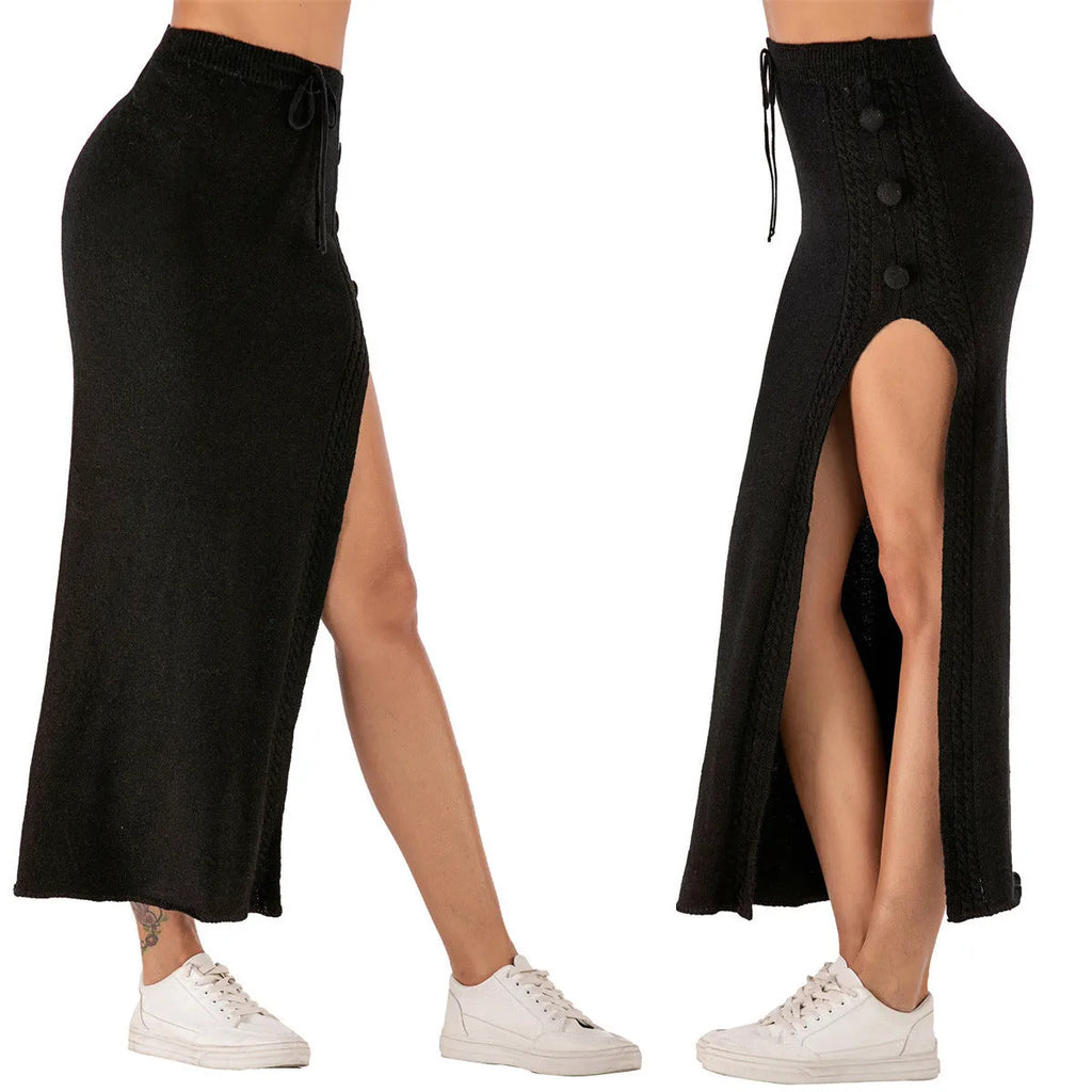 A slim-fit black mid-length women's skirt with a high split and decorative strap details on a mannequin.