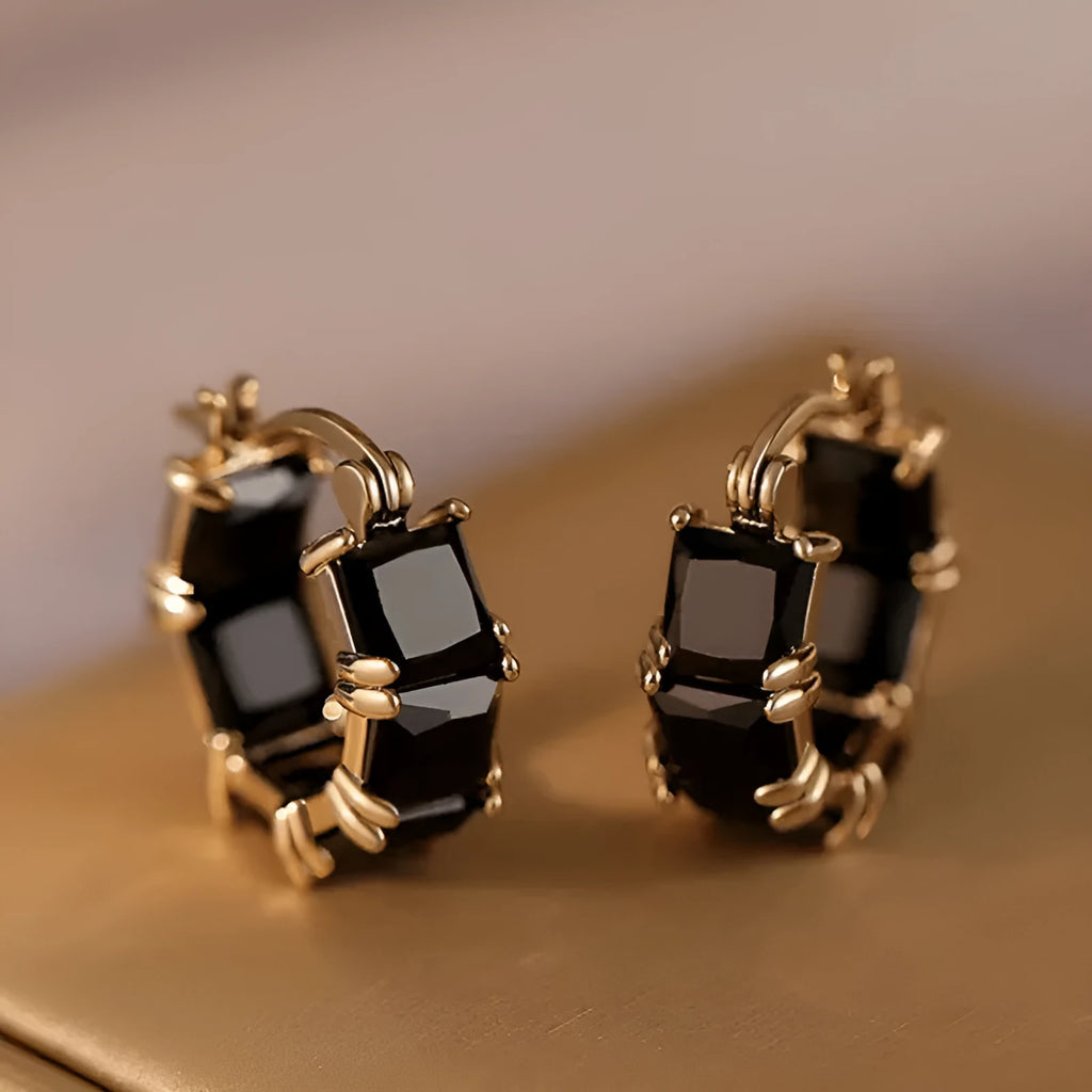 Geometric U-shaped gold earrings with round crystal zirconium stones in black, pink, or white options