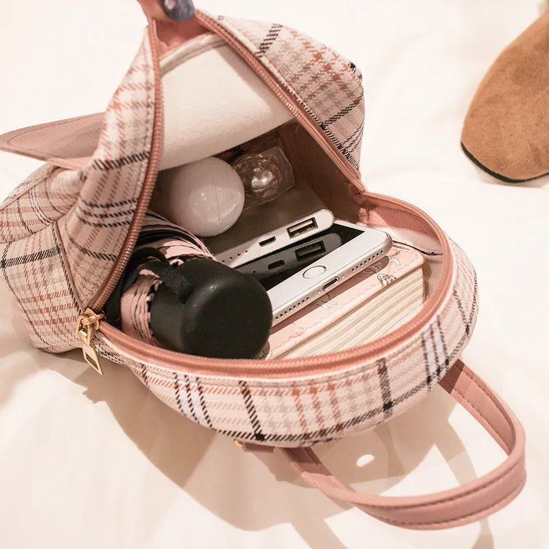 A PU leather one-shoulder diagonal phone bag with an adjustable crossbody strap, shown in a choice of colours.
