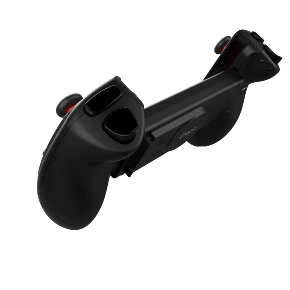 Red telescopic Bluetooth gamepad controller expanded to hold mobile device with USB cable