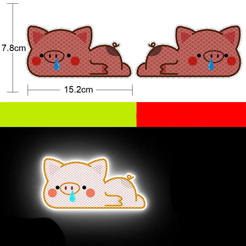 A pair of diamond reflective film warning stickers for vehicles, measuring 9 by 5 centimetres, showing assorted design options.