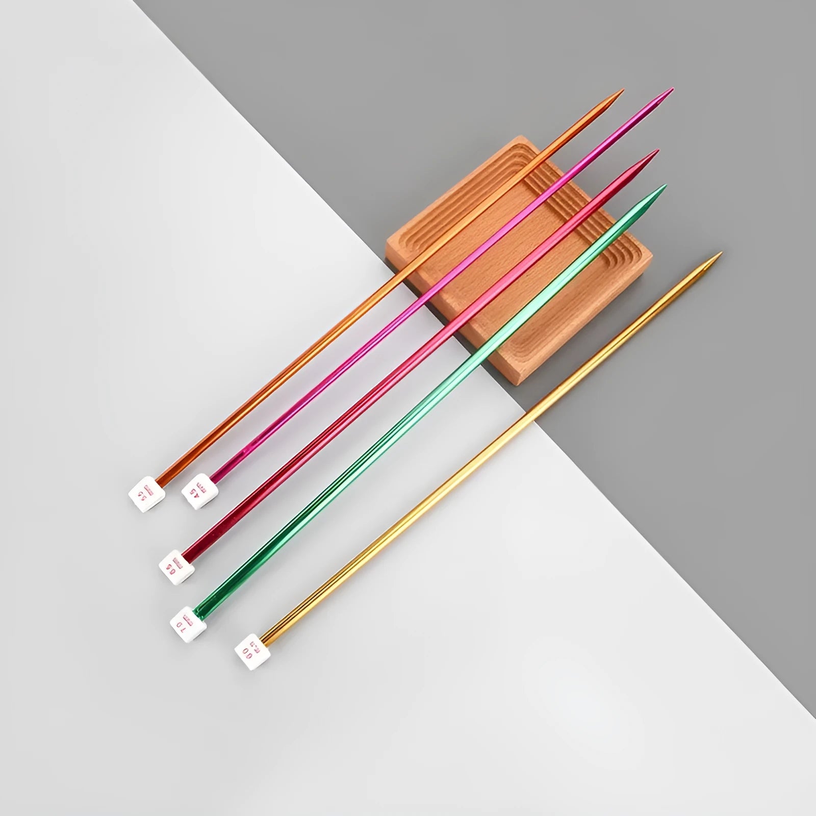 Set of lengthened crochet hooks in multiple sizes from 2.0mm to 10.0mm with protective end caps.