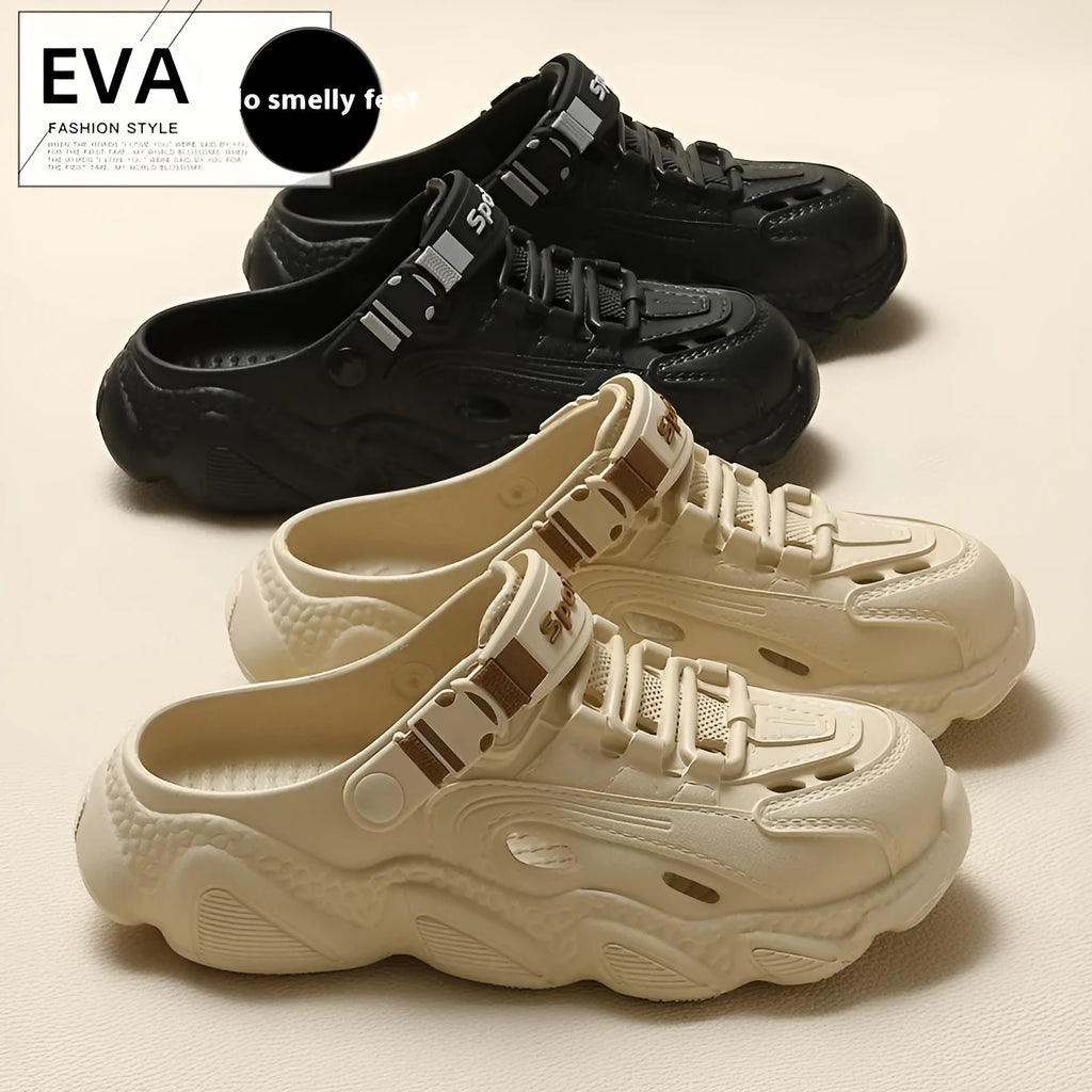Men's khaki outdoor slippers with hollow out design and light EVA sole on a wooden deck.
