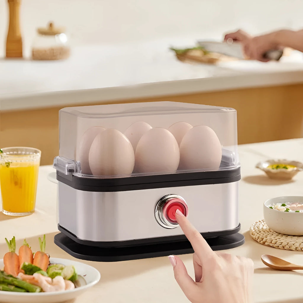 Black stainless steel mini portable egg boiler on a white background.