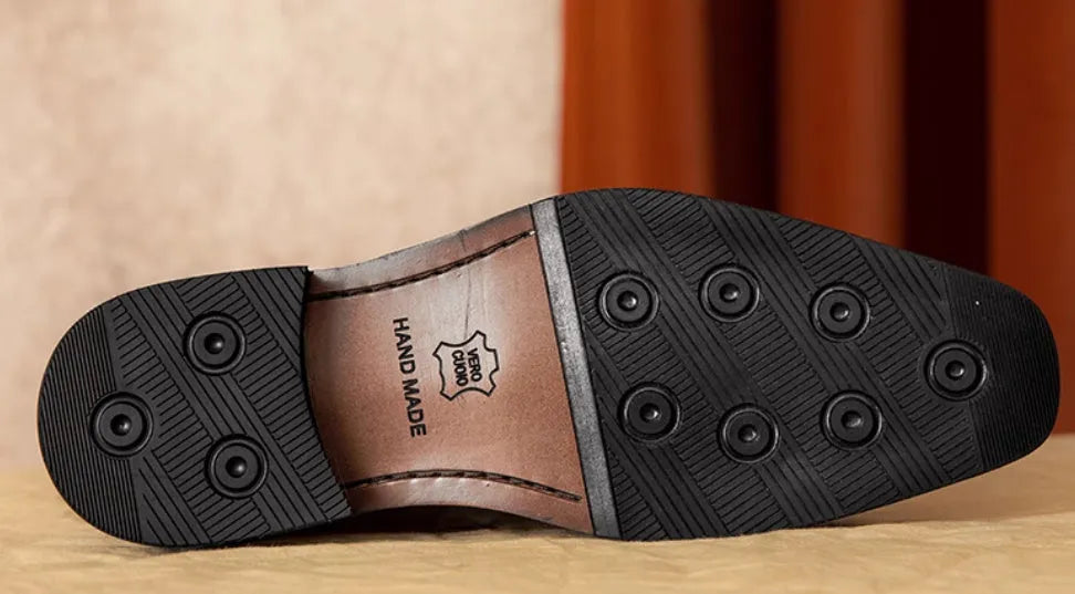 Men's genuine leather slip-on loafers in black and brown with fringed detailing and rubber soles