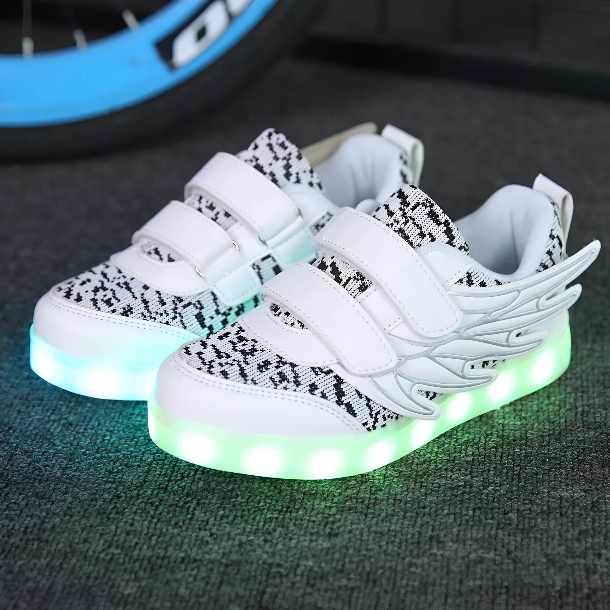 Children's plum red and white LED light up sneakers with USB charging port and colourful illuminated soles
