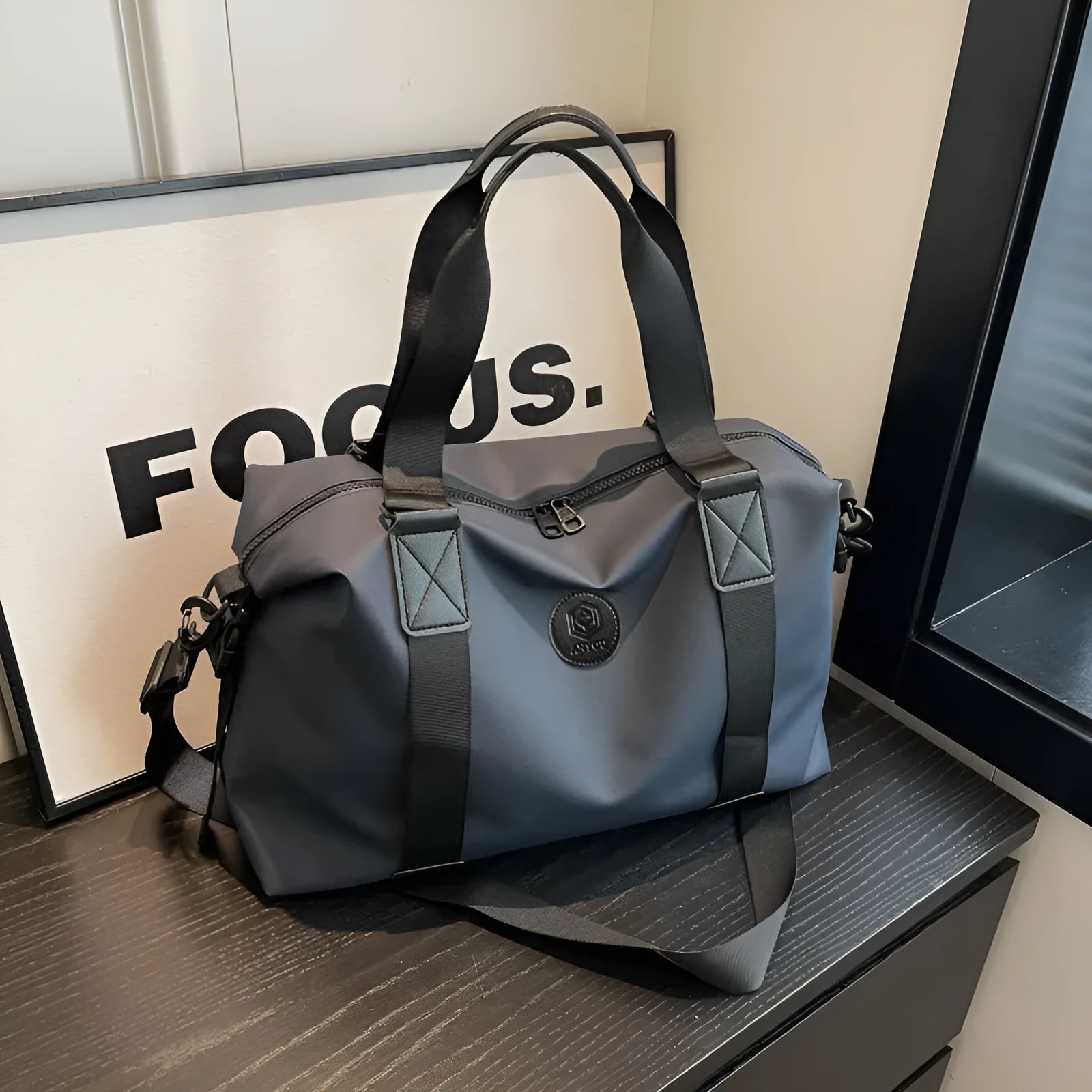 Waterproof Oxford cloth travel bag in solid colour with breathable back panel and 36-55L capacity
