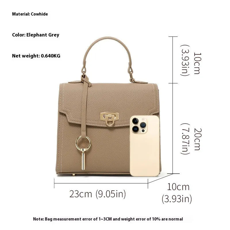 Elephant grey genuine leather handbag with litchi pattern texture and vintage lock hardware