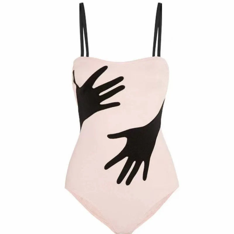 Women's one-piece bikini swimsuit with gauze skirt detail in polyester fabric.