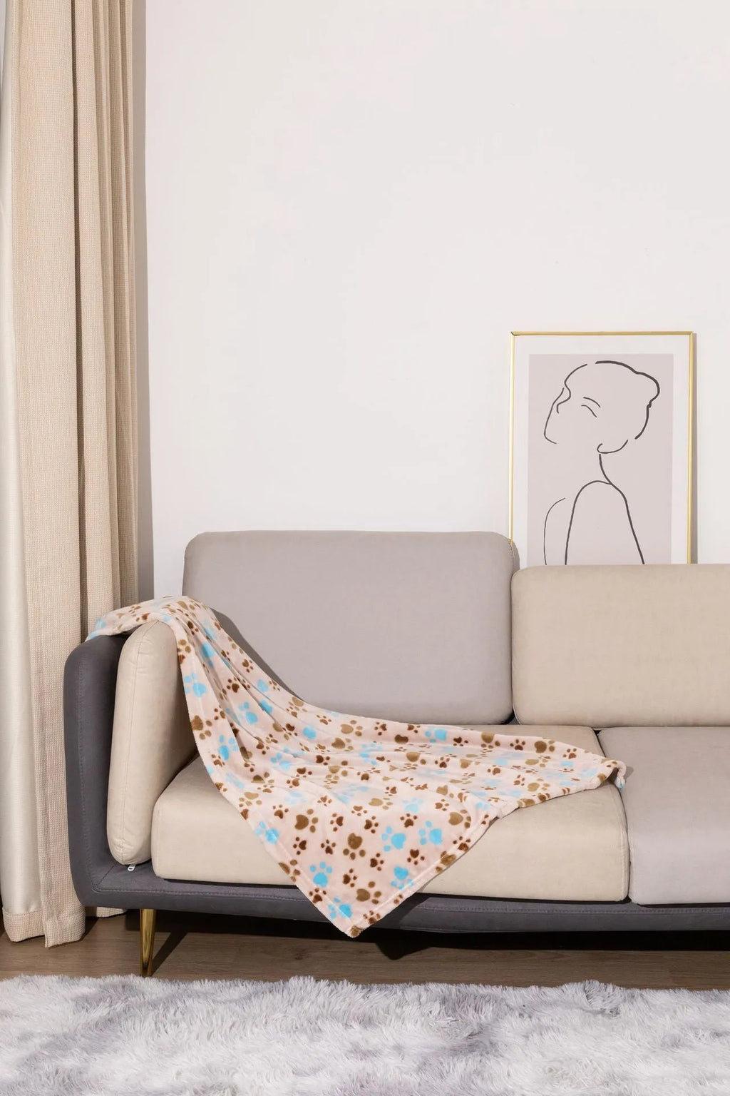 Blue cartoon dog print double-sided thickened flannel pet blanket laid flat.