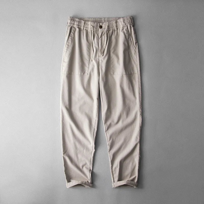 Men's linen casual trousers in navy blue, apricot, and grey colours with mid waist design