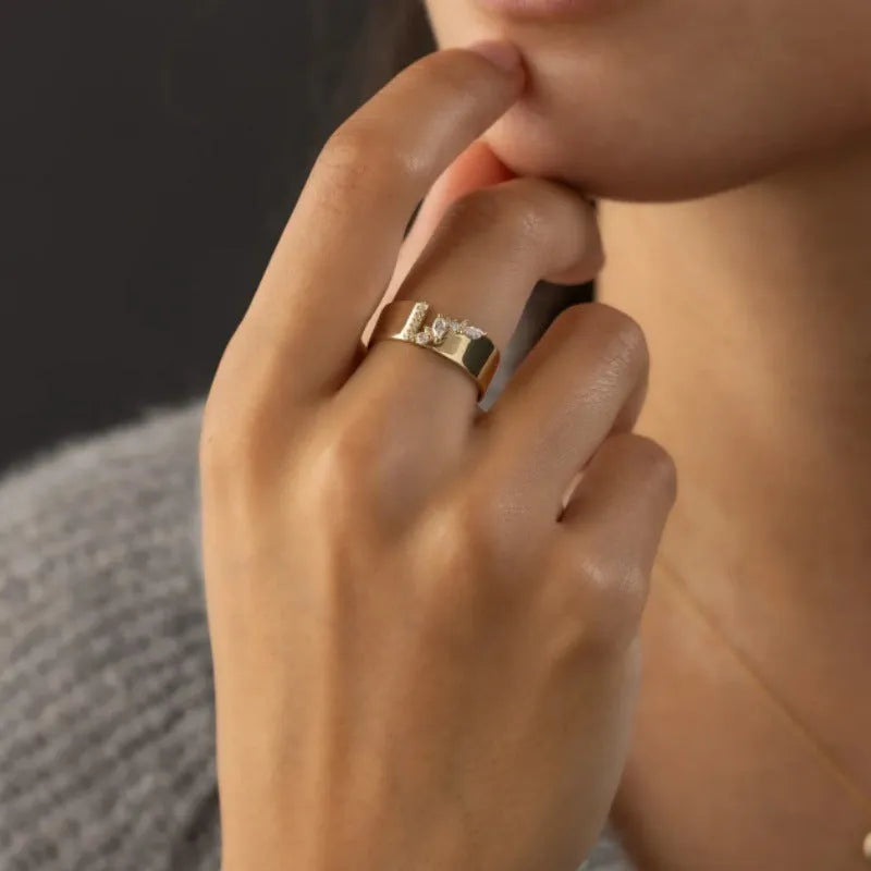 Gold-coloured women's ring with zircon accents on copper base, showing electroplated finish and personality style design.