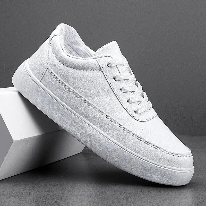 Women's leather lace-up flat casual shoes in white, shown on a light background.