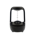 White anti-gravity water droplet humidifier with 500ml tank on a desk.