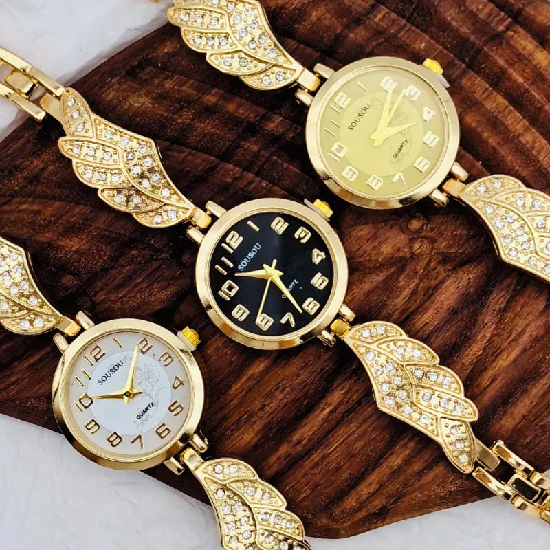 Stainless steel women's watch with round dial on wrist, showing Vachette clasp buckle