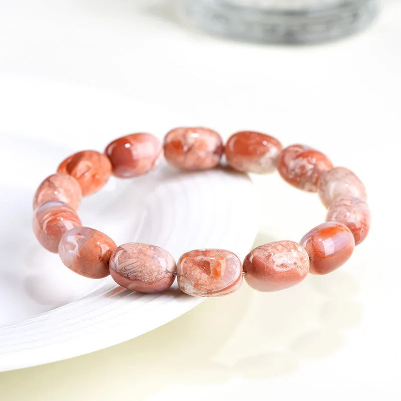 Natural cherry agate barrel bead bracelet with Ruyi design, 10x14mm beads on wrist