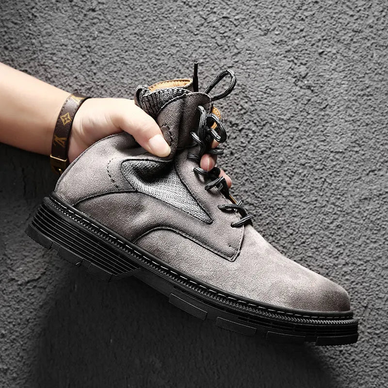 Men's vintage round toe Martin boots in black, grey, and sand colours with a low thick heel.