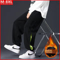 Men's loose cotton trousers with ankle banding and skinny leg design in black colour