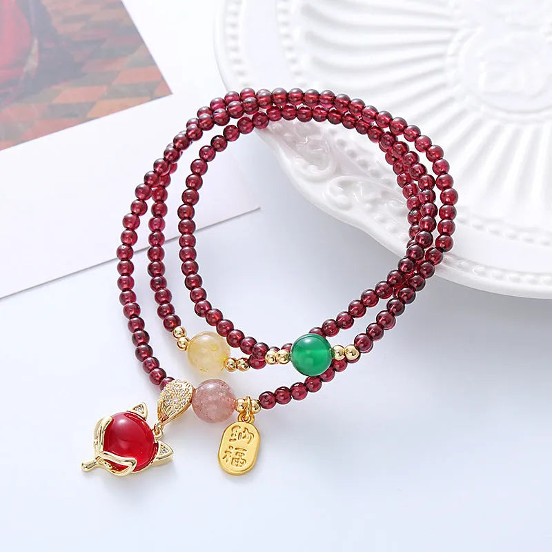 Purplish red garnet fox charm bracelet with adjustable rope for women