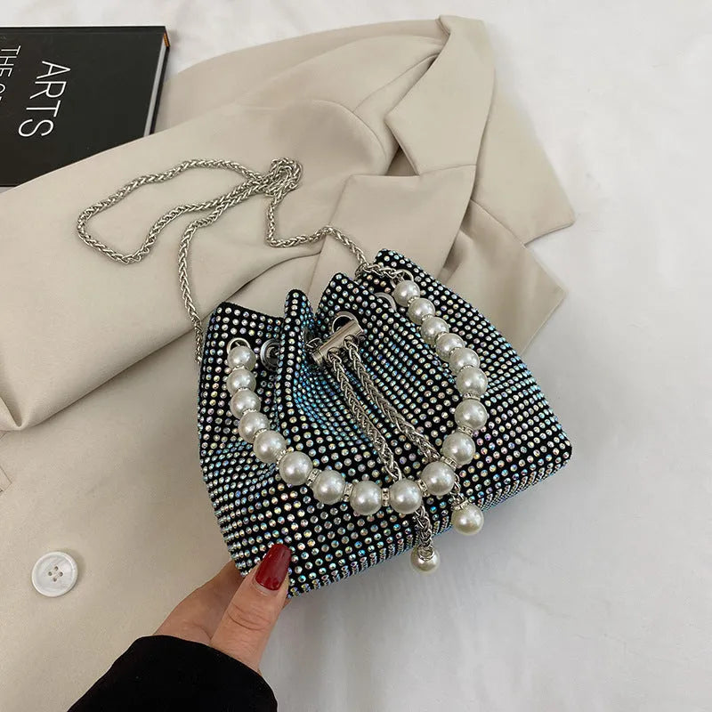 Diamond shoulder strap crossbody bucket bag in soft PU with chain detail and internal organisers
