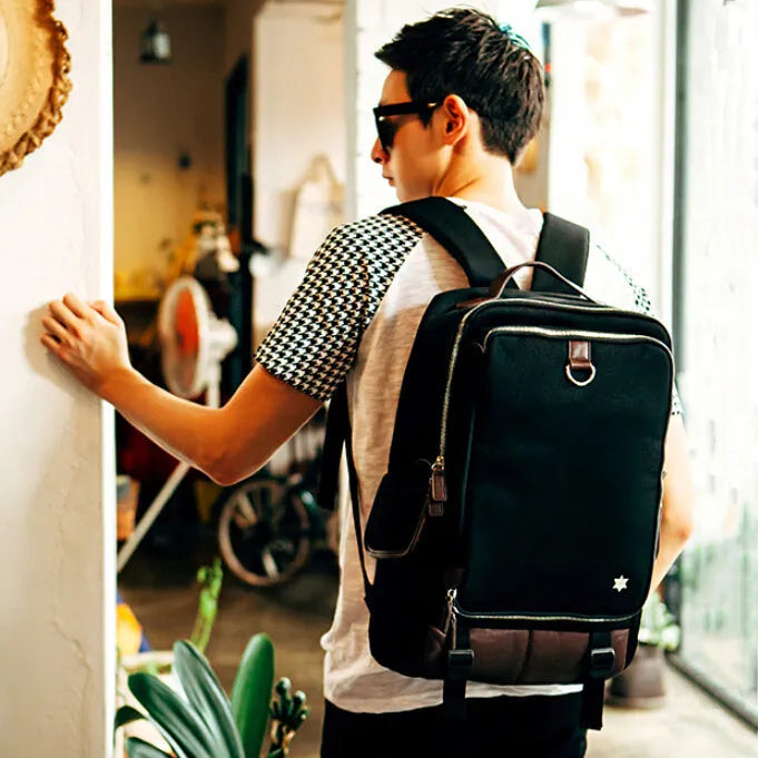 Modern Korean design Oxford cloth men's backpack in army green colour showing large capacity.