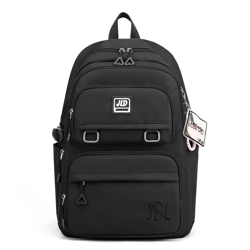 Girls' large waterproof nylon school backpack with physiological curve backplate, shown in a choice of colours.