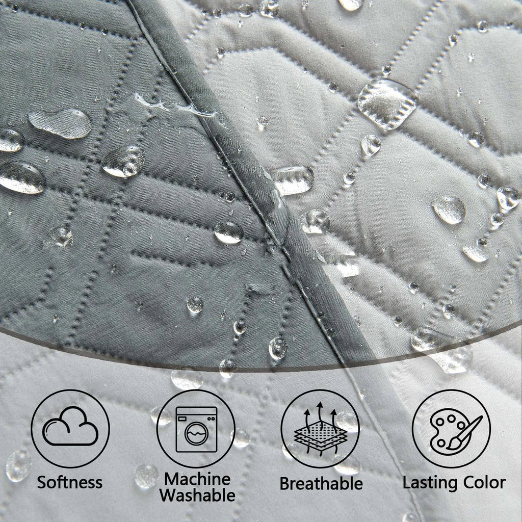 Reversible waterproof dog sofa cushion in dark grey and light grey contrast colours on a sofa.