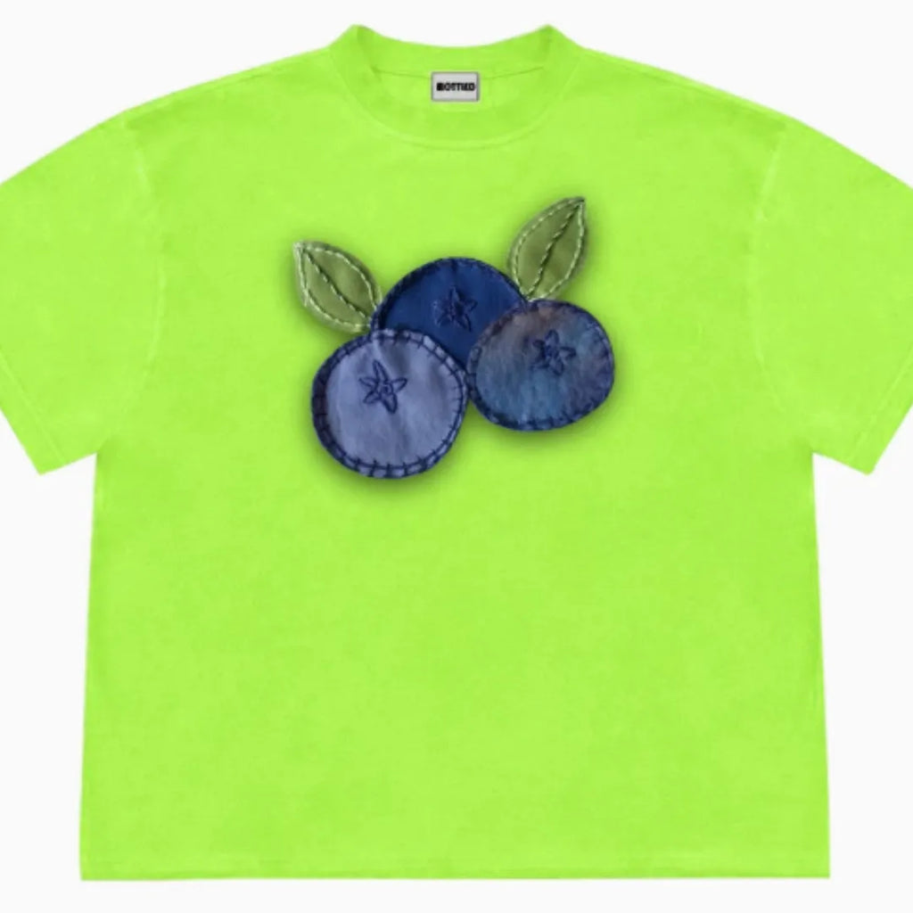 Blueberry and plant patchwork print on a women's loose-fit ice cotton t-shirt.