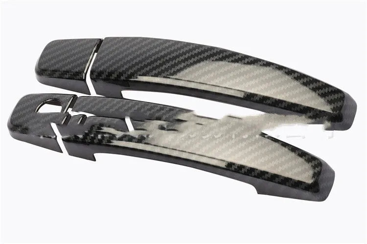 Carbon fibre pattern door handle cover for Opel Vauxhall Astra H and J models.
