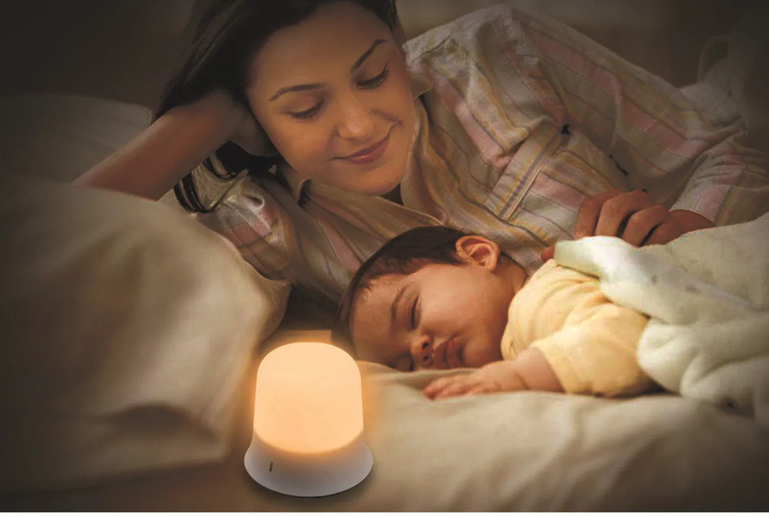 White bedside night light with touch controls for dimming and colour changing