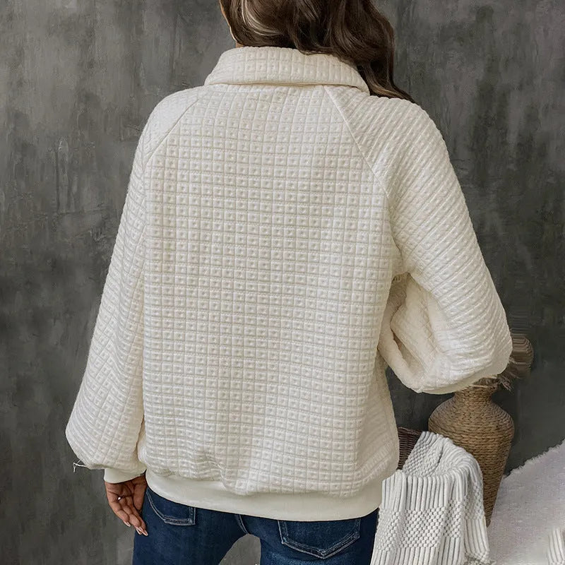 Women's milky white polo collar textured sweater on a hanger