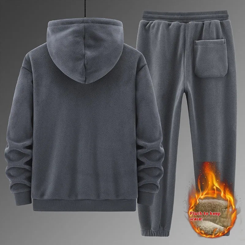 Grey men's cashmere hooded sweater and matching cotton trousers casual sports suit set on a hanger.