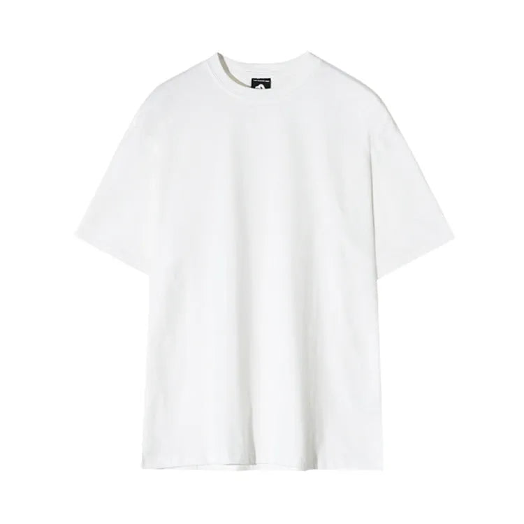 Men's slim fit cotton half sleeve t-shirt in black, showing round neck and regular sleeve design.
