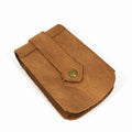 Crazy horse leather key case in dark brown, 7cm by 11.5cm, resting on a surface