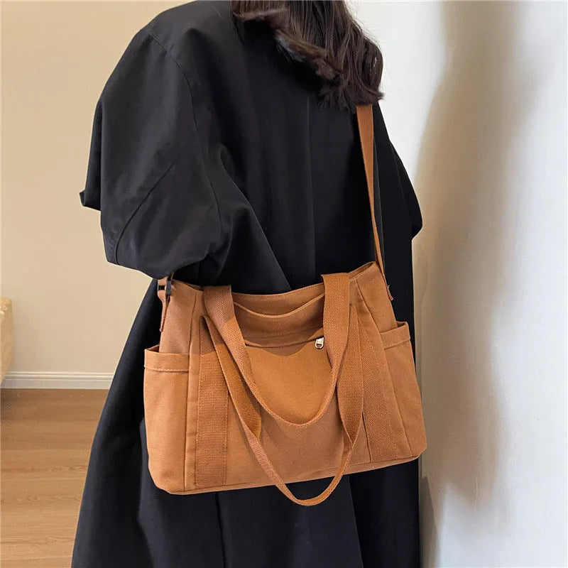 Large capacity polyester shoulder bag for women in four colours with mobile phone compartment