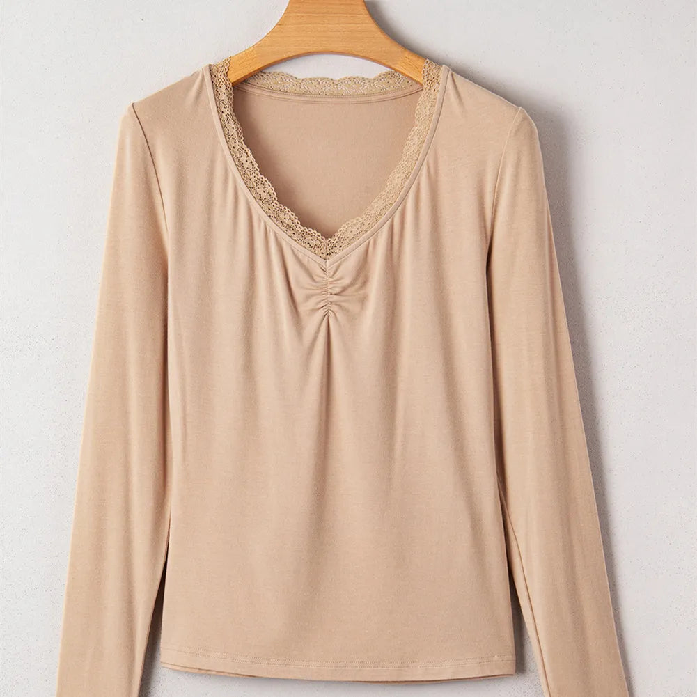 Red women's casual top with lace trim detail and long sleeves in slim fit design