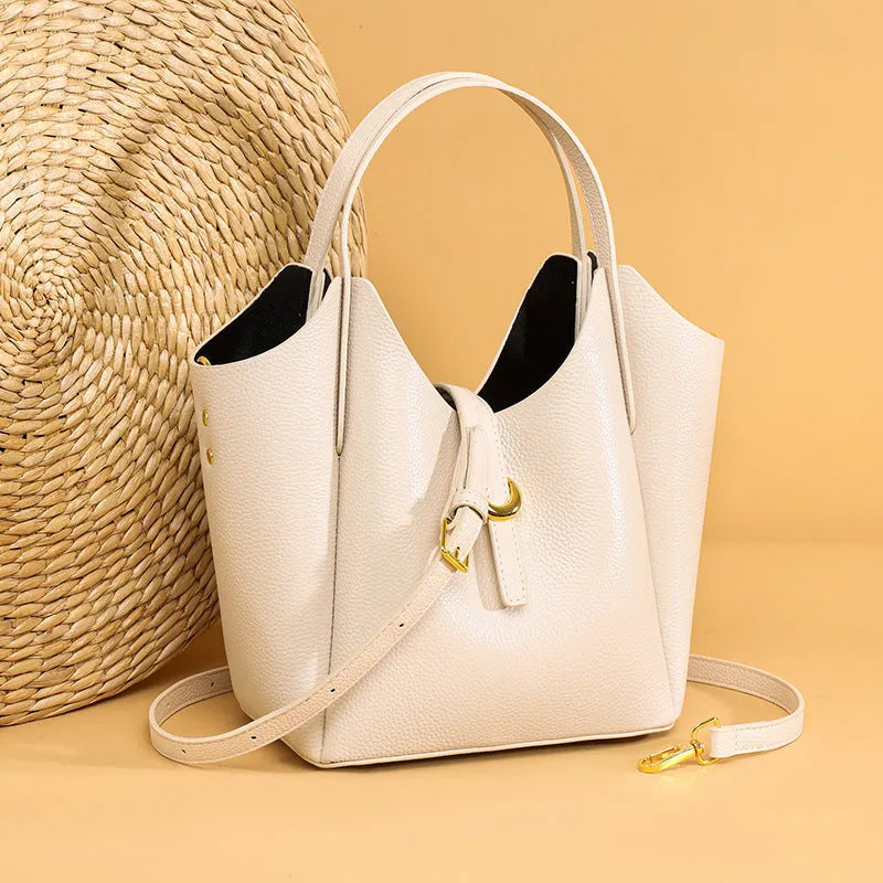 Women's genuine leather retro bucket bag with hand holding design and file organisation compartments
