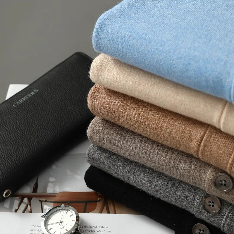 Man wearing a beige Andy velvet V-neck cardigan coat with long sleeves
